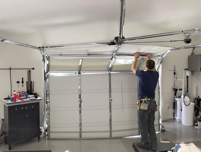 Cerritos Garage Door Repair specialist performing precise section replacement on Cerritos garage door